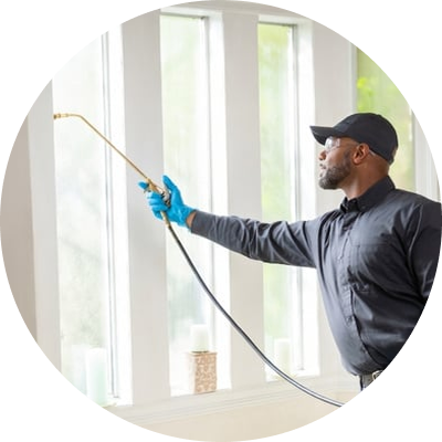 Terminix technician spraying
